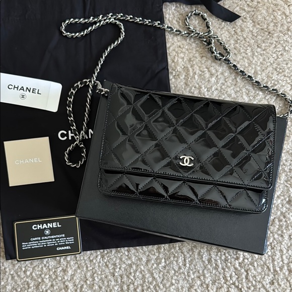 CHANEL Handbags - Chanel black patent woc wallet on chain bag